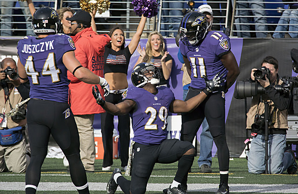 Running back Justin Forsett of the Baltimore Ravens celebrates a touchdown against the Tennessee Titans at M&T Bank Stadium on November 9, 2014 in Baltimore, Maryland. Photo Courtesy: Keith Allison