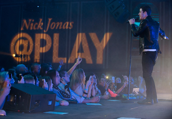 The performance by Nick Jonas at the Hilton Anatole was the first time an entire live performance was broadcasted on Twitter and Periscope. Photo Courtesy: Cooper Neill / Getty Images
