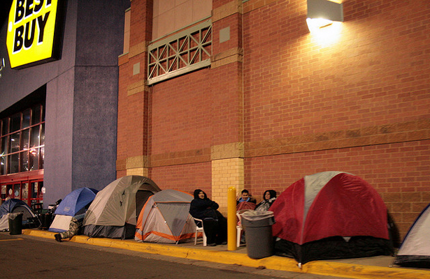 Remember to be a good customer you need to camp out for the best specials! Photo Courtesy: David Haines