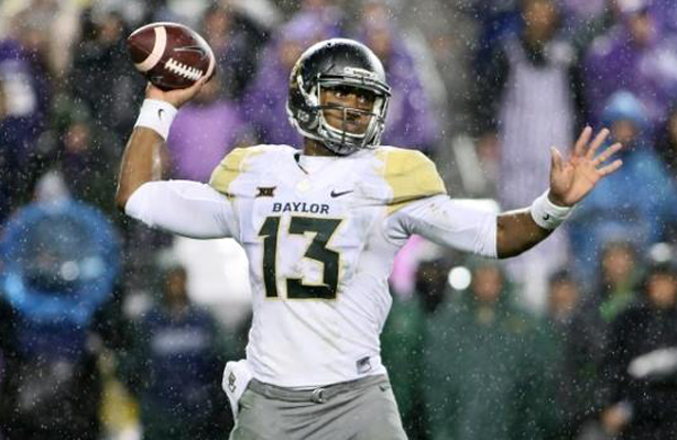 Baylor Bears QB Chris Johnson battled the weather to complete 7 of 24 passes for 62 yards with a TD and an interception. Photo Courtesy: Dominic Ceraldi