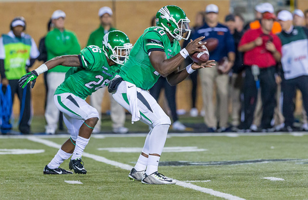 Mean Green QB DaMarcus Smith (10) will rely heavily on RB Jeffrey Wilson (26) to get the offense going against UTEP. Photo Courtesy: Sandy McAnally