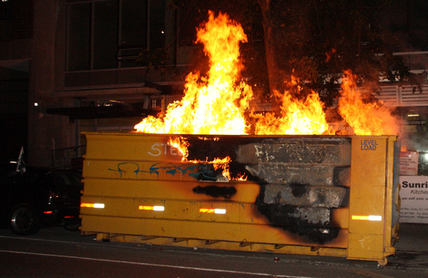 This image of a dumpster fire is probably the correct description of the football programs in Austin and College Station. Photo Courtesy: Brian Neumann
